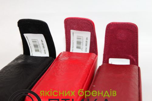 Футляри з тисненням на пояс